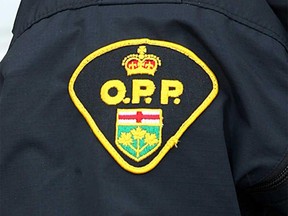 An Ontario Provincial Police badge is shown in this undated file photo.