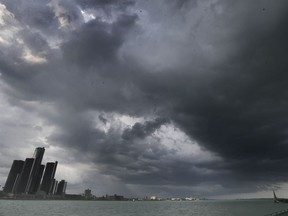 Large storm clouds hang over the Detroit river in downtown Windsor, ON. on Wednesday, June 10, 2020. Emergency crews were kept busy as severe storms downed trees and wires all over the city.
