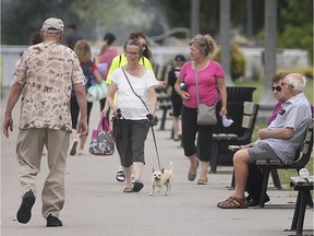 More space, please. People enjoy the sun and the outdoors at Reaume Park in Windsor on Friday, June 26, 2020. Participants of a webinar on Friday envisioned a post-pandemic Windsor with more shared public spaces to walk and relax.