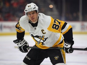 Sidney Crosby of the Pittsburgh Penguins prepares for a faceoff while playing the Detroit Red Wings at Little Caesars Arena on April 2, 2019, in Detroit.