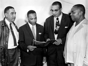 “Mister Emancipation: The Walter Perry Story" highlights momentous occasions like this one on Aug. 7, 1956, when Rev. Martin Luther King, fresh from leading a civil rights movement bus boycott in Montgomery, Ala., was a guest speaker at that year's Emancipation Day celebration at Jackson Park in Windsor. From left: Russel Small, Rev. Martin Luther King, Rev. Theodore Boone and Walter Perry.