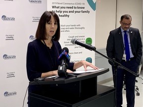 Theresa Marentette, CEO of the Windsor-Essex County Health Unit, addresses media on March 24, 2020, as medical officer of health Dr. Wajid Ahmed looks on.