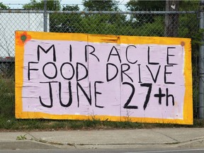 One of the many hand-painted signs across Windsor and Essex County for the June 27th Miracle is shown June 22, 2020, on Walker Road near Wyandotte Street East in the city.