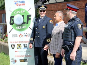 Windsor Fire and Rescue Services Deputy Chief James Waffle, left, local realtor Goran Todorovic and Windsor Police Deputy Chief Jason Bellaire pose during Can-Am Golf Series press conference at Roseland Golf and Curling Club on Friday, July 31, 2020. The golf series supports the 2022 Police-Fire Games.