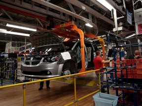 Workers are seen at the FCA Windsor Assembly Plant on Oct. 5, 2018 in Windsor.