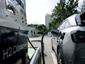 A Hyundai Motor's Nexo hydrogen car is fuelled at a hydrogen station in Seoul, South Korea, Aug. 13, 2019.