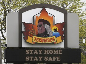 A Town of Tecumseh sign with COVID-19 message is shown in front of the municipal offices on April 29, 2020.