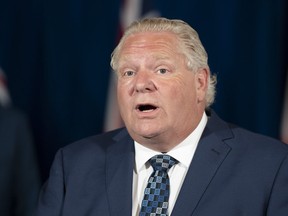 Ontario Premier Doug Ford answers questions during the daily briefing at Queen’s Park in Toronto on Friday, July 3, 2020.