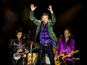 Mick Jagger of the Rolling Stones performs between band members Keith Richards and Ronnie Wood during their No Filter U.S. Tour at Rose Bowl Stadium in Pasadena, California, U.S., August 22, 2019.