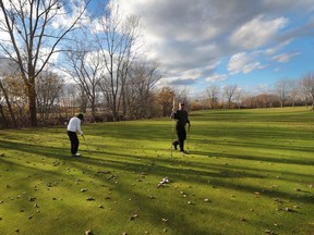 Golfers enjoy some late-season golf on Nov. 6, 2015, at the Little River Golf Course in Windsor.