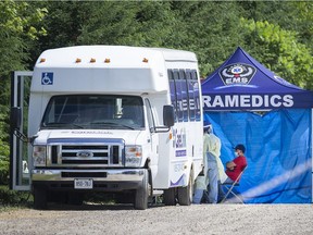 A migrant worker gets tested at a mobile testing unit conducted by Essex-Windsor EMS at a farm in Kingsville, June 18, 2020.