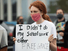 Students protest in support of a Black Groves High School student, who was jailed due to a probation violation of not keeping up with her online schoolwork in Pontiac, Michigan, July 16, 2020.