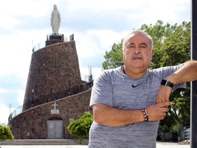 Paul Tawil visits the Our Lady of Lebanon shrine at The Leamington Lebanese Club, Wednesday.  Tawil has family members in Beirut, Lebanon who were unfortunate victims of the massive explosion.