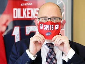 In this file photo from Aug. 12, Windsor Mayor Drew Dilkens wears a Windsor Spitfires face mask at city hall.