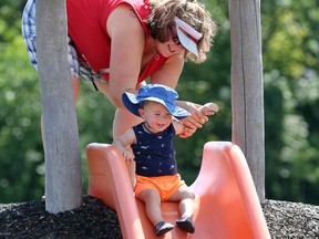 Wyatt Phillips, 1, loved the slide at Mitchell Park Wednesday.  Wyatt was with his mother, Meaghan Phillips.