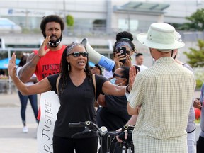 Leslie McCurdy, centre, is shown during the Walk for Justice rally at Dieppe Park in Windsor on Aug. 30, 2020.