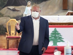 Premier Doug Ford is shown at the St. Charbel Antonin Maronite Catholic Church in Windsor on Thursday, August 13, 2020. He met with members of the Lebanese community at the parish to show support regarding the recent tragedy in Beirut.