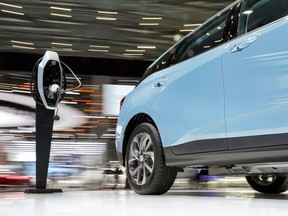 FILE PHOTO: A charging station for Buick's electric vehicles (EV) is seen next to the new Velite 6 during the media day for Shanghai auto show in Shanghai, China, April 17, 2019.