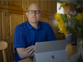 Windsor Mayor Drew Dilkens, sitting next to his laptop at home, Thursday, Aug. 20, 2020.