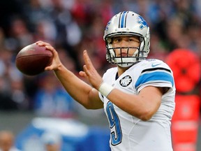 FILE PHOTO: Detroit Lions quarterback Matthew Stafford throws against the Atlanta Falcons during their NFL football game at Wembley Stadium in London, October 26, 2014.