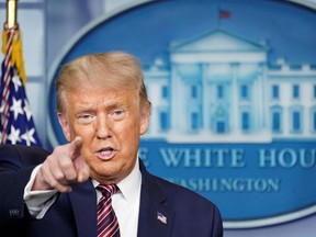 U.S. President Donald Trump takes questions during a briefing on the coronavirus disease (COVID-19) pandemic at the White House in Washington, U.S., August 12, 2020.