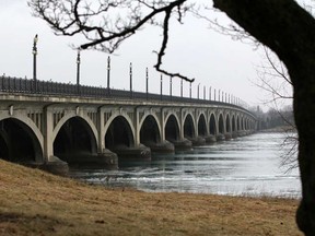 MacArthur Bridge connecting the Detroit shoreline with Belle Isle is shown in this 2013 file photo.