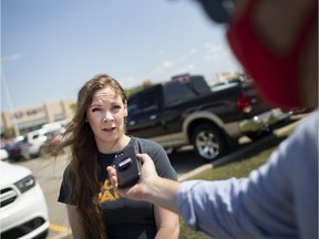 Currie Soulliere speaks to the media before trying to enter Devonshire Mall for a planned shopping trip without a mask, Saturday, Aug. 22, 2020.