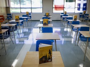 A classroom with social distancing measures in place is seen at St. Thomas of Villanova Catholic High School, as schools prepare to return in September during the COVID-19 pandemic, Thursday, August 6, 2020.