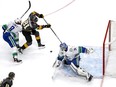 Thatcher Demko stops a shot against Jonathan Marchessault of the Vegas Golden Knights during the first period in Game Five.