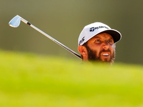 Dustin Johnson of the United States reacts on the eighth hole during the final round of the TOUR Championship at East Lake Golf Club on Sept. 7, 2020, in Atlanta, Georgia.