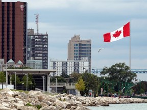 Helped by a north wind, the Great Canadian Flag looks great against the Windsor skyline and waterfront July 24, 2017.