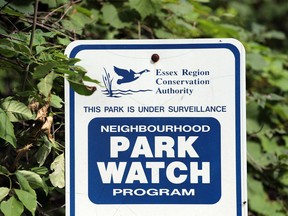 ERCA signage at Devonwood Conservation Area in Windsor, shown Sunday, warns against mischief.