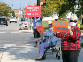 Senior Ellen Badet, front right, joined Clifford Connell and other seniors at a rally on Sandwich Street Saturday, Sept. 26, 2020, to protest a dangerous in Amherstburg.
