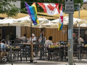 Patio goers enjoy the first weekend of level 2 COVID-19 openings in Toronto on Saturday, June 27, 2020.