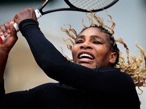 Serena Williams of the US reacts as she plays against Kristie Ahn of the US during their women's singles first round tennis match at the Philippe Chatrier court on Day 2 of The Roland Garros 2020 French Open tennis tournament in Paris on September 28, 2020.