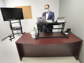 Dustin O'Neil, principal for a the Greater Essex County District School Board's virtual elementary school, is shown in his office on Tuesday, Sept. 8, 2020, preparing the virtual learning experience for students.