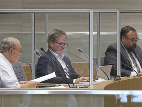 For the first time in almost six months Windsor City councillors and administration participated in a in-person meeting at City Hall on Monday, September 14, 2020. It was a hybrid version of the regular meeting where some members were in council chambers while others joined online. Councillors Ed Sleiman, left, Gary Kaschak and Rino Bortolin are shown during the meeting.