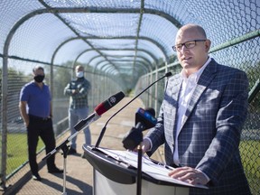 Mayor Drew Dilkens provides an update on the construction being done on E.C. Row Expressway on Friday from the walkway over the expressway.