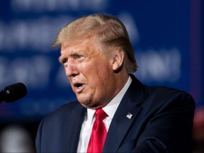 U.S. President Donald Trump addresses a crowd during a campaign rally at Smith Reynolds Airport in Winston Salem, N.C., Tuesday, Sept. 8, 2020.