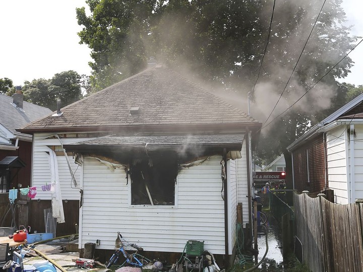  Windsor firefighters are shown at the scene of a house fire on Tuesday, September 15, 2020 in the 1200 block of Hickory Rd. Four adults and two children were displaced and a neighbour who tried to extinguish the fire was treated for minor smoke inhalation.