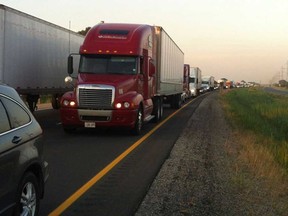Traffic on Highway 401 east of Chatham-Kent is shown in this July 2012 file photo.
