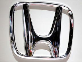 FILE PHOTO: The logo of Honda is seen during the 88th International Motor Show at Palexpo in Geneva, Switzerland, March 6, 2018.