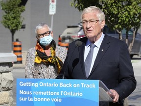 MPP Ernie Hardeman, centre, Provincial Minister of Agriculture, Food and Rural Affairs speaks at a press conference on Friday, September 18, 2020, in Leamington where he announced funding to the town for an assortment of improvements. Leamington Mayor Hilda McDonald looks on during the announcement.