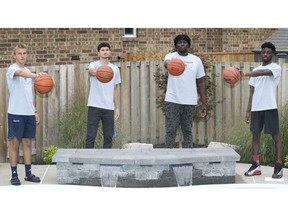 TECUMSEH, ON. SEPTEMBER 9, 2020 -  University of Windsor basketball recruits, from left, Brayden Amlin, Ben Mascarenhas, Segun Akin-Akinbulumo and Isaiah Mayambu are shown on Wednesday, September 9, 2020 in Tecumseh, ON. (DAN JANISSE - The Windsor Star)