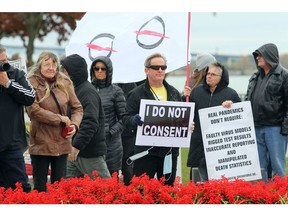 Windsor, Ontario. October 25, 2020. Over 100 people gather at Windsor's Dieppe Park for the "great demonstration against harmful COVID-19 measures," Sunday. Most in attendance were not wearing protective masks. (Windsor Star photo)