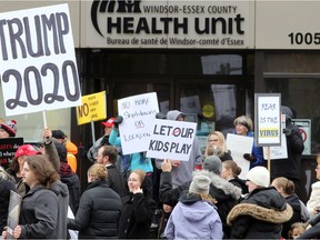 More than 100 demonstrators marched to the Windsor-Essex Health Unit on Ouellette Avenue Sunday afternoon.  A majority of the group were not wearing masks and gathered in close quarters to listen to speakers talk about how lockdown restrictions are unnecessary and unfair infringement on freedom.