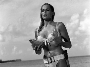 This undated publicity photo provided by United Artists and Danjaq, LLC shows Ursula Andress in a scene from the James Bond film, "Dr. No."