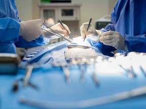 Surgery performed in a hospital operating room.