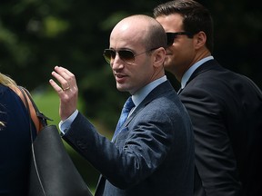 In this file photo taken on August 6, 2020 President Donald Trump's senior advisor Stephen Miller waves to supporters at the White House in Washington.