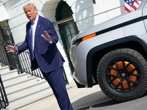 US President Donald Trump speaks before inspecting the Lordstown Motors 2021 endurance truck, an electric pickup truck, in front of the White House in Washington, DC on September 28, 2020.